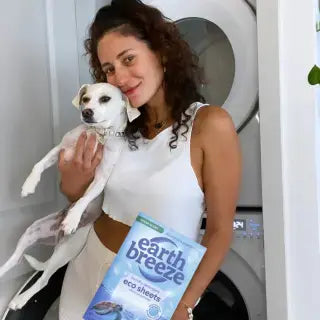 Customer and dog with Earth Breeze detergent sheets